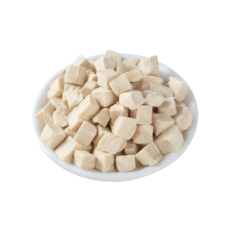 Freeze-dried chicken cubes in a white bowl
